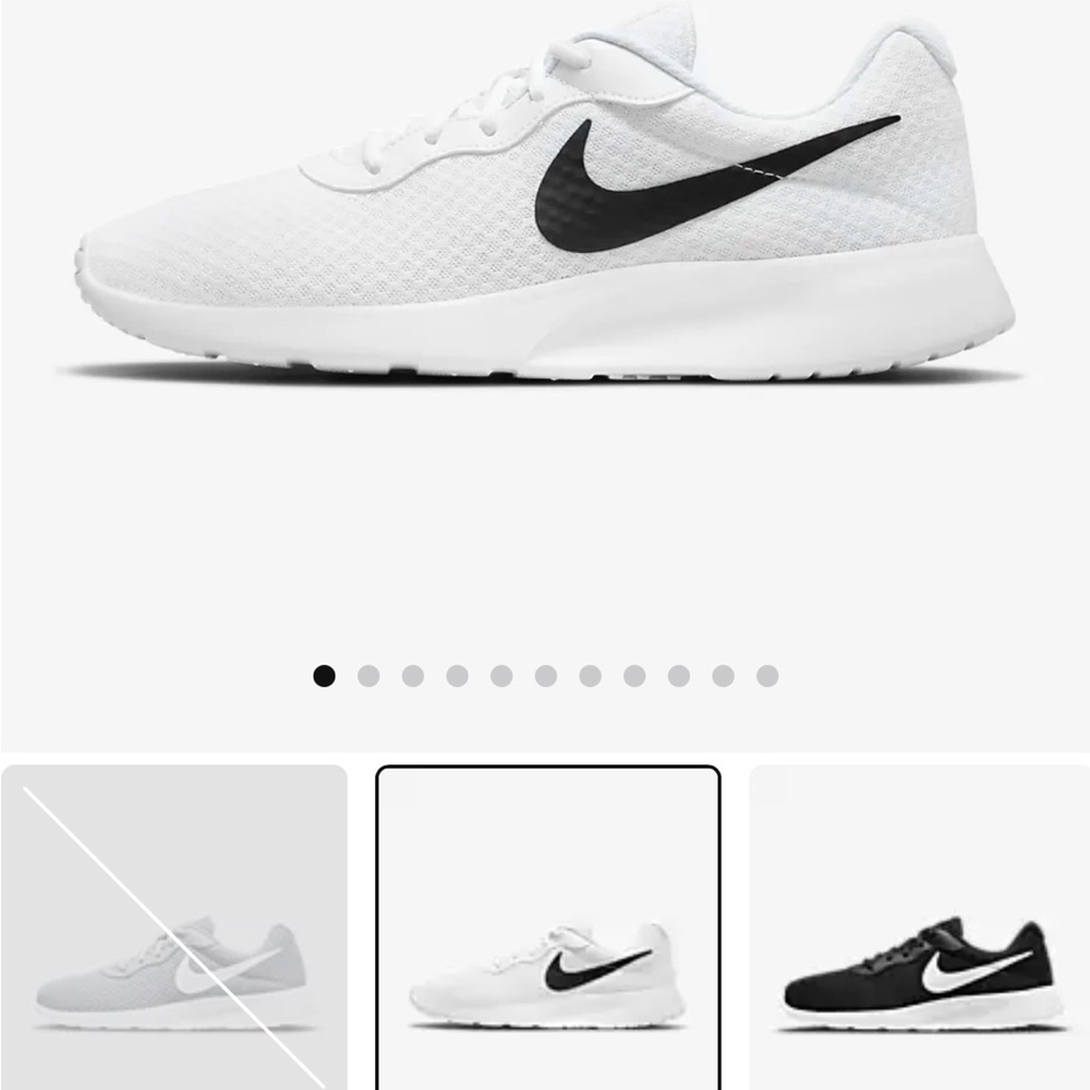 White Nike Tanjun running shoes. Like new condition